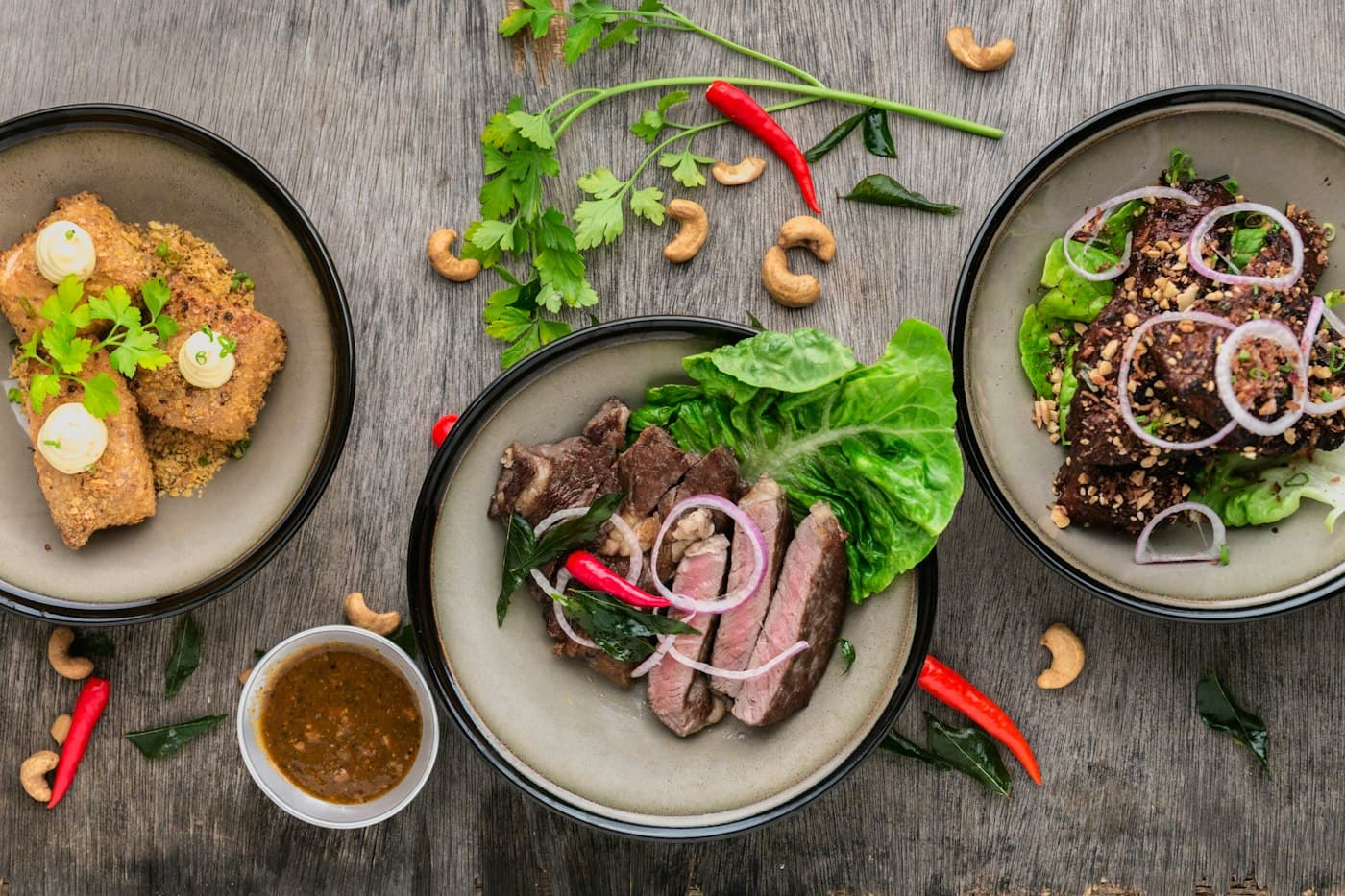 Plates of freshly prepared food on a table